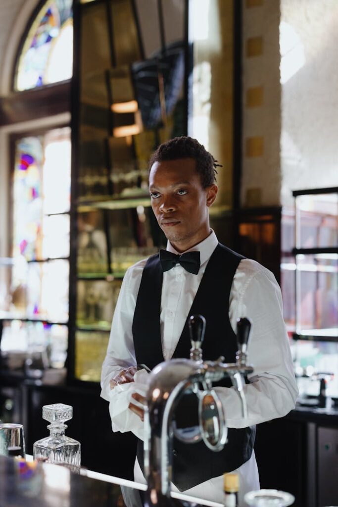 Bartender standing behind the Counter