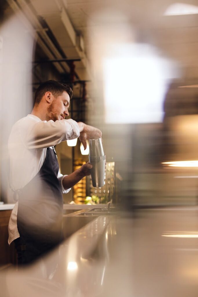 Person Mixing Drinks